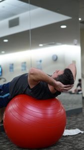 man on exercise ball